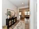 Entryway featuring wood-look floors, decor, and an open view to the living room at 3872 New Battle Ln, Bargersville, IN 46106