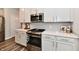 Kitchen with stainless steel appliances, granite countertops, and ample storage at 3872 New Battle Ln, Bargersville, IN 46106