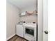 Laundry room with modern white washer and dryer appliances at 3872 New Battle Ln, Bargersville, IN 46106