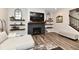 Cozy living room features a fireplace, floating shelves, and modern decor for a welcoming atmosphere at 3872 New Battle Ln, Bargersville, IN 46106
