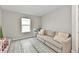 Inviting playroom with a comfortable couch, natural light, and space for play and creativity at 3872 New Battle Ln, Bargersville, IN 46106
