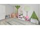 Cheerful playroom featuring a tree mural, organized toys, and a spacious area for imaginative play at 3872 New Battle Ln, Bargersville, IN 46106