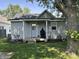 Back exterior view of home and covered back porch at 420 S Oak St, Fortville, IN 46040