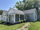 Charming home featuring a covered front porch and a well maintained front yard at 420 S Oak St, Fortville, IN 46040