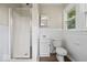 Cozy bathroom featuring a shower, vanity, toilet and a window offering natural light at 4255 N County Road 1025 E, Indianapolis, IN 46234