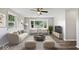 Bright living room featuring hardwood floors, modern furniture and large window at 4255 N County Road 1025 E, Indianapolis, IN 46234