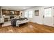 Warm and inviting living room with a decorative fireplace and hardwood flooring at 4275 Springwood Trl, Indianapolis, IN 46228