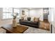 Comfortable living room with hardwood floors and lots of natural light at 4275 Springwood Trl, Indianapolis, IN 46228