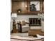 Well-decorated living room featuring a stylish fireplace and comfortable seating at 4275 Springwood Trl, Indianapolis, IN 46228