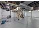 Unfinished basement with visible ductwork and staircase at 450 N Fenton Ave, Indianapolis, IN 46219