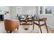 Bright living room featuring modern furniture, light-colored walls, and large windows for ample natural light at 450 N Fenton Ave, Indianapolis, IN 46219