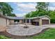 Backyard featuring a concrete patio, a grill, and greenery at 4853 E 65Th St, Indianapolis, IN 46220