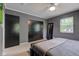 Bedroom featuring plush carpeting, and a sliding door closet at 4853 E 65Th St, Indianapolis, IN 46220