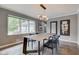Bright dining room features a modern chandelier at 4853 E 65Th St, Indianapolis, IN 46220