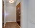 Welcoming home entryway featuring hardwood floors and a stylish door at 4853 E 65Th St, Indianapolis, IN 46220