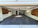 Clean, spacious garage with ample storage cabinets, painted walls, and a sealed concrete floor at 4853 E 65Th St, Indianapolis, IN 46220