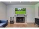 Bright living room with fireplace and TV, perfect for relaxation at 4853 E 65Th St, Indianapolis, IN 46220