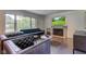 Cozy living room featuring a fireplace and a scenic outdoor view at 4853 E 65Th St, Indianapolis, IN 46220