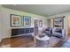 Open-concept living room with stylish furnishings and dining area access at 4853 E 65Th St, Indianapolis, IN 46220