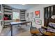 Sunlit office space with stylish furniture and ample shelving at 4853 E 65Th St, Indianapolis, IN 46220