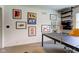 Bright office space decorated with race car art and ample shelving at 4853 E 65Th St, Indianapolis, IN 46220