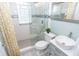 Modern bathroom featuring a glass-enclosed shower, vessel sink, and stylish fixtures for a spa-like experience at 5133 E Michigan St, Indianapolis, IN 46219