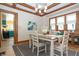 Cozy dining room featuring a built-in cabinet, natural light, and stylish decor at 5133 E Michigan St, Indianapolis, IN 46219