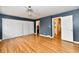Spacious bedroom features hardwood floors, ample closet space, and adjacent bathroom access at 5153 Brendonshire Ct, Indianapolis, IN 46226