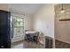 Eat-in kitchen with natural light, a modern light fixture, and a stainless steel garbage can at 5216 Lakeside Manor Blvd, Indianapolis, IN 46254