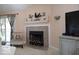Cozy living room with fireplace and neutral decor at 5216 Lakeside Manor Blvd, Indianapolis, IN 46254
