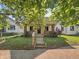Charming single-Gathering home with a well-kept lawn and a welcoming front porch at 621 N Livingston Ave, Indianapolis, IN 46222