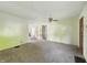 A carpeted living room with open doorway at 621 N Livingston Ave, Indianapolis, IN 46222