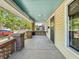 A side view of the brick and concrete porch at 621 N Livingston Ave, Indianapolis, IN 46222