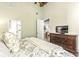 Bedroom with tv and ensuite bath at 630 N College Ave # 204, Indianapolis, IN 46204
