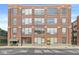 Brick building exterior with a canopy over the entrance and large windows at 630 N College Ave # 204, Indianapolis, IN 46204