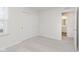 Bedroom with plush carpeting and an open doorway to a bathroom at 7330 Shroyer Way, Noblesville, IN 46062