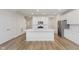 Spacious kitchen featuring a center island, modern appliances, and ample cabinet space at 7330 Shroyer Way, Noblesville, IN 46062