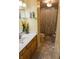 Functional bathroom featuring a vanity with sink, toilet, and shower with curtain at 7402 Broadview Dr, Indianapolis, IN 46227