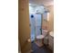 Bathroom featuring a glass enclosed shower, toilet, modern vanity, and neutral decor at 7402 Broadview Dr, Indianapolis, IN 46227