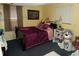 Bedroom featuring a full sized bed, comfortable bedding, and cozy natural lighting at 7402 Broadview Dr, Indianapolis, IN 46227