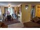 Inviting open-concept living and dining area with natural light and comfortable seating at 7402 Broadview Dr, Indianapolis, IN 46227