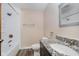 Bright bathroom featuring a shower and tub combination and granite counters on vanity at 7418 Southern Lakes Dr, Indianapolis, IN 46237