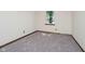 Bedroom featuring carpet and window at 7418 Southern Lakes Dr, Indianapolis, IN 46237