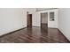 Spacious and bright living room with wood-look flooring at 7418 Southern Lakes Dr, Indianapolis, IN 46237