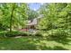 Charming home featuring a beautifully landscaped backyard, perfect for outdoor gatherings and relaxation at 7426 Shadow Wood Dr, Indianapolis, IN 46254