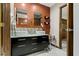 Modern bathroom featuring double sinks, stylish tile, and sleek vanity for a luxurious experience at 7426 Shadow Wood Dr, Indianapolis, IN 46254