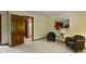 Inviting bedroom offers a peaceful retreat with dark trim, ensuite bathroom and stylish decor at 7426 Shadow Wood Dr, Indianapolis, IN 46254