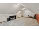 Bonus room featuring vaulted ceilings and versatile space for hobbies, entertainment, or relaxation at 7426 Shadow Wood Dr, Indianapolis, IN 46254