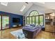 Spacious living room with large windows and a sliding door at 7426 Shadow Wood Dr, Indianapolis, IN 46254