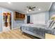 Well-lit bedroom with closet and hardwood floors, creating a perfect sanctuary at 7630 Blain Way, Indianapolis, IN 46254